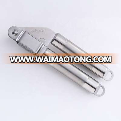 KG024  high quality manual kitchen utensil rocker tool oil  crusher  stainless steel   garlic press